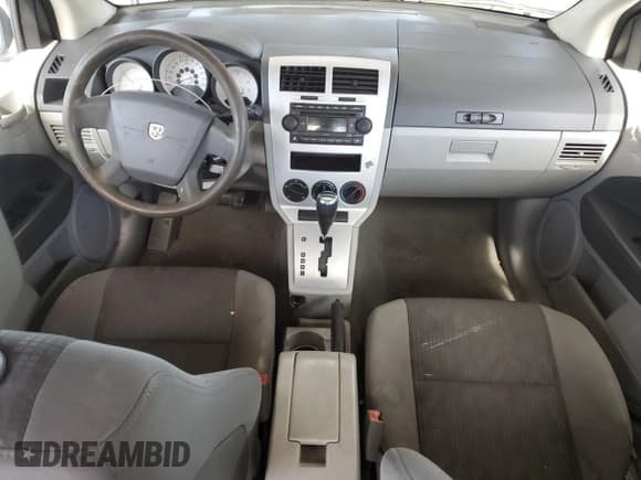 ✅ 2007 Dodge Caliber • VIN: 1B3HB28B37D271167 • Лот: 82017804. Опубликован ранее на Copart с пробегом 182 081 миль. Бесплатный доступ к архиву аукционных продаж из США и подробный отчёт об истории автомобиля на DreamBid. Изображение 8.