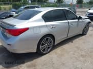 ✅ 2015 Infiniti Q50 Premium • VIN: JN1BV7AP8FM335266 • Лот: 42373495. Опубликован ранее на IAAI с пробегом 128 143 миль. Бесплатный доступ к архиву аукционных продаж из США и подробный отчёт об истории автомобиля на DreamBid. Изображение 4.