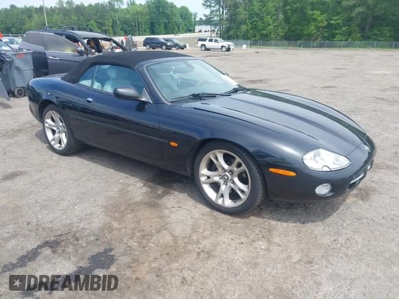 ✅ 2003 Jaguar XK • VIN: SAJDA42C732A35547 • Lot: 42090286. Listed on IAAI with 65,840 mi. Free auction sales archive from the USA and detailed vehicle history report at DreamBid. Image 1.