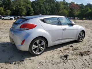 ✅ 2016 Hyundai Veloster • VIN: KMHTC6AD8GU272996 • Lot: 70380414. Wystawiony na Copart z przebiegiem 86 498 mil. Bezpłatny archiwum sprzedaży aukcyjnych z USA i szczegółowy raport historii pojazdu na DreamBid. Zdjęcie 3.