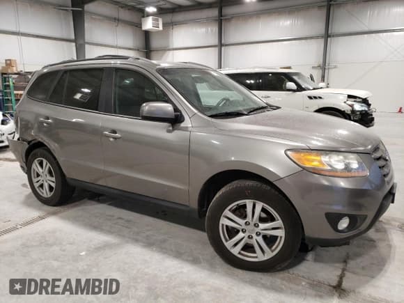 ✅ 2011 Hyundai Santa Fe SE • VIN: 5XYZHDAG4BG005119 • Lot: 85141464. Listed on Copart with 186,384 mi. Free auction sales archive from the USA and detailed vehicle history report at DreamBid. Image 4.