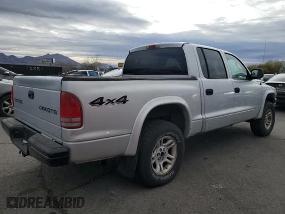 ✅ 2003 Dodge Dakota Sport • VIN: 1D7HG38N23S205026 • Lot: 82214314. Wystawiony na Copart z przebiegiem 194 724 mil. Bezpłatny archiwum sprzedaży aukcyjnych z USA i szczegółowy raport historii pojazdu na DreamBid. Zdjęcie 3.