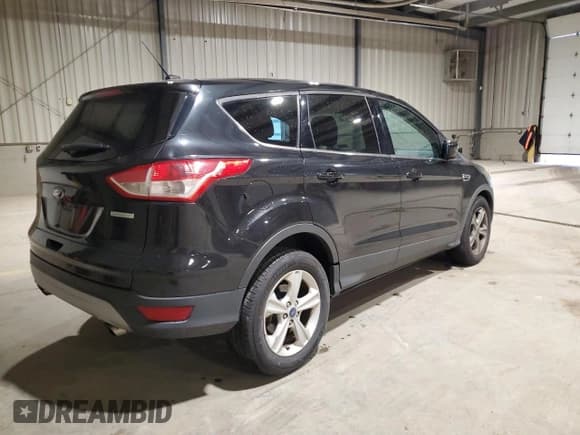 ✅ 2014 Ford Escape SE • VIN: 1FMCU0GX9EUB23716 • Lot: 93231185. Listed on Copart with 102,811 mi. Free auction sales archive from the USA and detailed vehicle history report at DreamBid. Image 3.