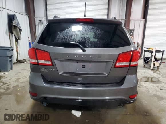 2012 Dodge Journey SXT с VIN 3C4PDDBG2CT181579, выставлен на аукционе Copart как лот 84757025 с пробегом 47 594 миль миль и Списание • Salvage title. История ставок и продаж доступна на DreamBid. Изображение 6.
