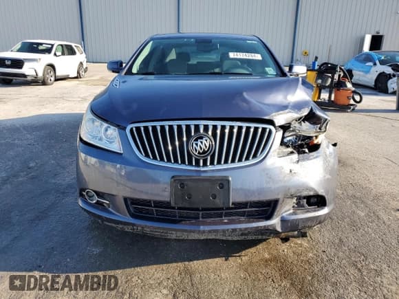 ✅ 2013 Buick LaCrosse • VIN: 1G4GL5G32DF182060 • Lot: 74174284. Wystawiony na Copart z przebiegiem 113 767 mil. Bezpłatny archiwum sprzedaży aukcyjnych z USA i szczegółowy raport historii pojazdu na DreamBid. Zdjęcie 5.