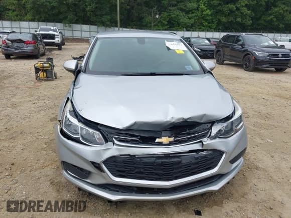 ✅ 2018 Chevrolet Cruze LS • VIN: 1G1BC5SM5J7214433 • Lot: 42616404. Listed on IAAI with 171,129 mi. Free auction sales archive from the USA and detailed vehicle history report at DreamBid. Image 12.