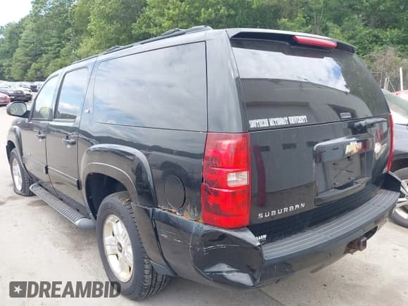 ✅ 2011 Chevrolet Suburban LT • VIN: 1GNSKJE31BR233032 • Lot: 42758398. Listed on IAAI with 167,514 mi. Free auction sales archive from the USA and detailed vehicle history report at DreamBid. Image 3.