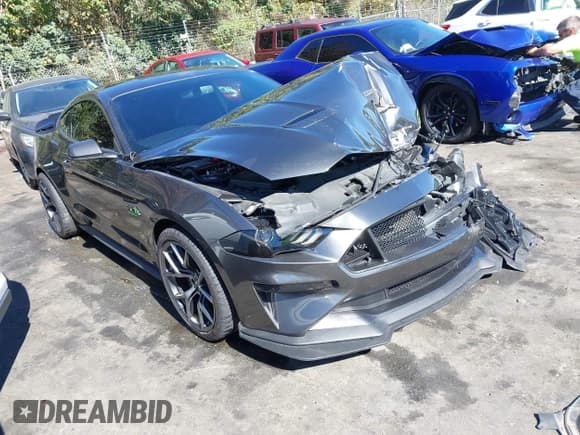 ✅ 2020 Ford Mustang GT Premium • VIN: 1FA6P8CF1L5145999 • Lot: 43462107. Wystawiony na IAAI z przebiegiem 57 866 mil. Bezpłatny archiwum sprzedaży aukcyjnych z USA i szczegółowy raport historii pojazdu na DreamBid. Zdjęcie 1.