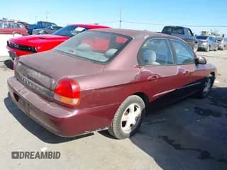 ✅ 1999 Hyundai Sonata GLS • VIN: KMHWF35V9XA042620 • Lot: 42922692. Listed on IAAI with 106,603 mi. Free auction sales archive from the USA and detailed vehicle history report at DreamBid. Image 4.