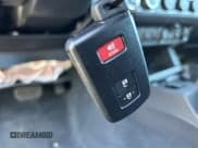 ✅ 2023 Toyota Tacoma SR • VIN: 3TYCZ5AN8PT152677 • Lot: 43587332. Listed on IAAI with 14,964 mi. Free auction sales archive from the USA and detailed vehicle history report at DreamBid. Image 11.