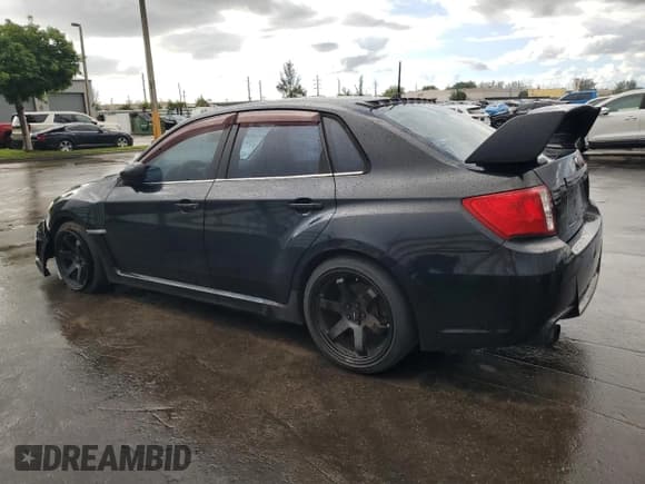 ✅ 2013 Subaru WRX WRX • VIN: JF1GV7E60DG025196 • Lot: 82292845. Listed on Copart with 128,049 mi. Free auction sales archive from the USA and detailed vehicle history report at DreamBid. Image 2.