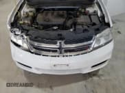 ✅ 2014 Dodge Avenger SE • VIN: 1C3CDZAB1EN215228 • Лот: 82381774. Опубликован ранее на Copart с пробегом 204 704 миль. Бесплатный доступ к архиву аукционных продаж из США и подробный отчёт об истории автомобиля на DreamBid. Изображение 11.