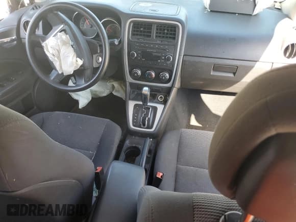 ✅ 2012 Dodge Caliber SXT • VIN: 1C3CDWDA6CD508644 • Лот: 79848714. Опубликован ранее на Copart с пробегом Не указан. Бесплатный доступ к архиву аукционных продаж из США и подробный отчёт об истории автомобиля на DreamBid. Изображение 8.