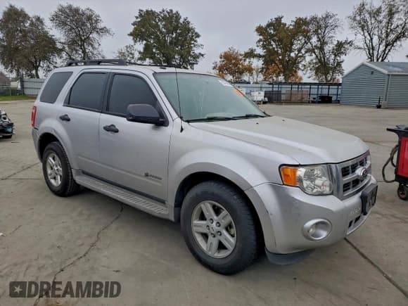 ✅ 2010 Ford Escape Hybrid • VIN: 1FMCU5K3XAKC65709 • Lot: 95794955. Wystawiony na Copart z przebiegiem 166 781 mil. Bezpłatny archiwum sprzedaży aukcyjnych z USA i szczegółowy raport historii pojazdu na DreamBid. Zdjęcie 4.