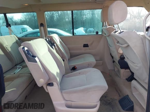 ✅ 2003 Volkswagen EuroVan GLS • VIN: WV2KB47083H013778 • Лот: 41537793. Опубликован ранее на IAAI с пробегом 127 315 миль. Бесплатный доступ к архиву аукционных продаж из США и подробный отчёт об истории автомобиля на DreamBid. Изображение 8.