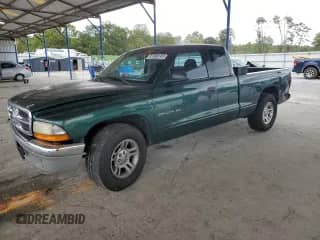 2001 Dodge Dakota with VIN 1B7GL22X01S345840, listed as a Copart auction lot 81890145 with 277,702 mi miles and Salvage title. Bid and sale history available at DreamBid. Image 1.