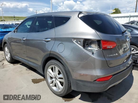 ✅ 2015 Hyundai Santa Fe • VIN: 5XYZWDLA4FG281062 • Лот: 60811773. Опубликован ранее на Copart с пробегом 80 342 миль. Бесплатный доступ к архиву аукционных продаж из США и подробный отчёт об истории автомобиля на DreamBid. Изображение 2.
