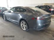 ✅ 2014 Tesla Model S 60 • VIN: 5YJSA1H15EFP60829 • Lot: 42610569. Listed on IAAI with 110,507 mi. Free auction sales archive from the USA and detailed vehicle history report at DreamBid. Image 3.