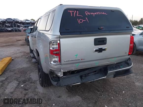 2018 Chevrolet Colorado 2WD LT z VIN 1GCGSCEN2J1229807, wystawiony jako IAAI lot #43391851 z przebiegiem 88 766 mil mil oraz . Historia ofert i sprzedaży dostępna na DreamBid. Obrazek 6.