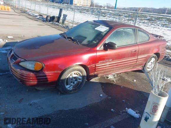 ✅ 2000 Pontiac Grand Am • VIN: 1G2NE12T5YM799819 • Lot: 43827279. Listed on IAAI with 167,017 mi. Free auction sales archive from the USA and detailed vehicle history report at DreamBid. Image 2.