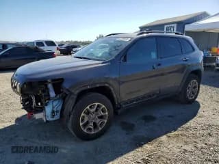 ✅ 2022 Jeep Cherokee Trailhawk • VIN: 1C4PJMBX5ND500586 • Lot: 82200035. Listed on Copart with 54,082 mi. Free auction sales archive from the USA and detailed vehicle history report at DreamBid. Image 1.