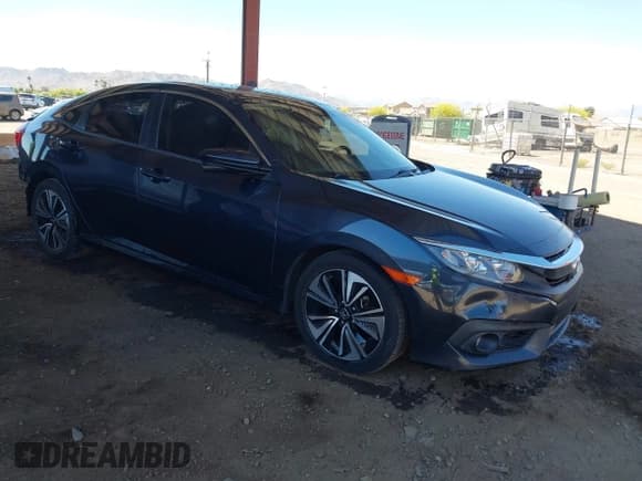 ✅ 2018 Honda Civic EX-L • VIN: JHMFC1F8XJX033602 • Лот: 42161015. Опубликован ранее на IAAI с пробегом 99 597 миль. Бесплатный доступ к архиву аукционных продаж из США и подробный отчёт об истории автомобиля на DreamBid. Изображение 1.