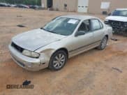 ✅ 1997 Nissan Altima XE • VIN: 1N4BU31D8VC237377 • Lot: 42789340. Listed on IAAI with 315,046 mi. Free auction sales archive from the USA and detailed vehicle history report at DreamBid. Image 2.