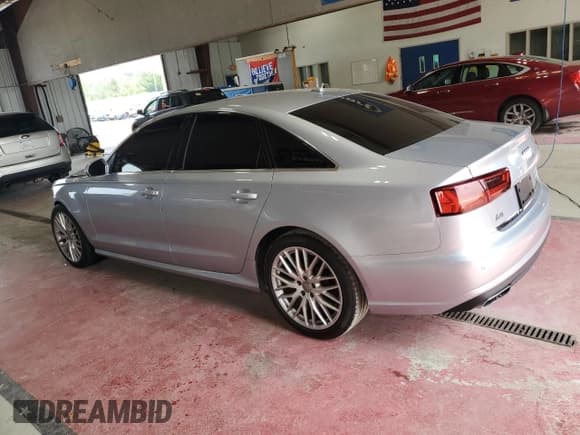 ✅ 2016 Audi A6 Premium • VIN: WAUFFAFC1GN124742 • Lot: 68173615. Listed on Copart with 115,675 mi. Free auction sales archive from the USA and detailed vehicle history report at DreamBid. Image 2.