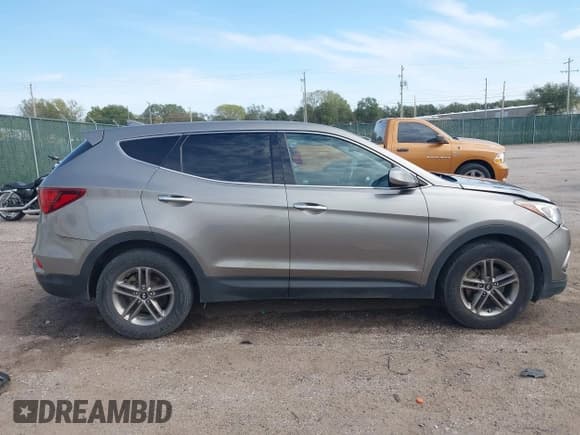 ✅ 2017 Hyundai Santa Fe 2.4L • VIN: 5XYZTDLB6HG442371 • Lot: 43471955. Listed on IAAI with 181,167 mi. Free auction sales archive from the USA and detailed vehicle history report at DreamBid. Image 13.