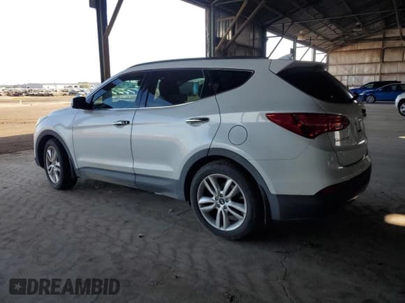 ✅ 2015 Hyundai Santa Fe • VIN: 5XYZW4LA0FG268728 • Lot: 92848595. Listed on Copart with 109,507 mi. Free auction sales archive from the USA and detailed vehicle history report at DreamBid. Image 2.