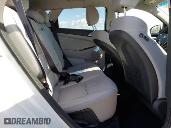 2019 Hyundai Tucson SE z VIN KM8J23A45KU869928, wystawiony jako Copart lot #87183485 z przebiegiem 42 648 mil mil oraz Szkoda całkowita • Salvage title. Historia ofert i sprzedaży dostępna na DreamBid. Obrazek 11.