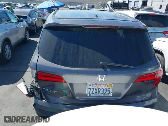 ✅ 2017 Honda Pilot EX-L • VIN: 5FNYF5H59HB030884 • Lot: 43118488. Listed on IAAI with 69,489 mi. Free auction sales archive from the USA and detailed vehicle history report at DreamBid. Image 16.