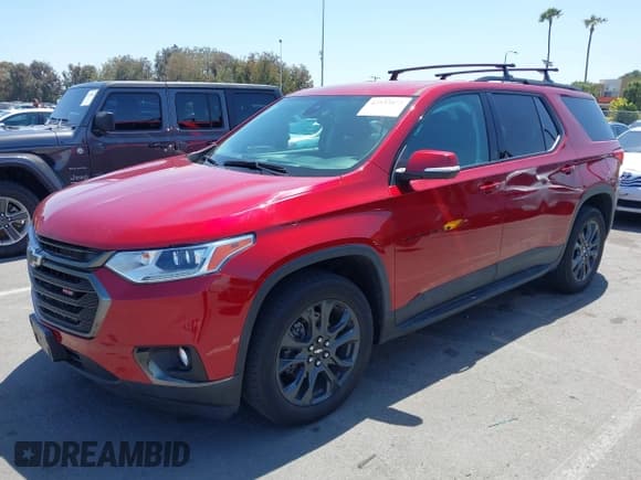 ✅ 2021 Chevrolet Traverse RS • VIN: 1GNERJKW1MJ137085 • Lot: 42533873. Listed on IAAI with 30,886 mi. Free auction sales archive from the USA and detailed vehicle history report at DreamBid. Image 2.