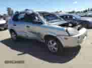 2005 Hyundai Tucson GL z VIN KM8JM12B25U076246, wystawiony jako Copart lot #54030704 z przebiegiem Nie podano mil oraz Szkoda całkowita • Salvage title. Historia ofert i sprzedaży dostępna na DreamBid. Obrazek 4.