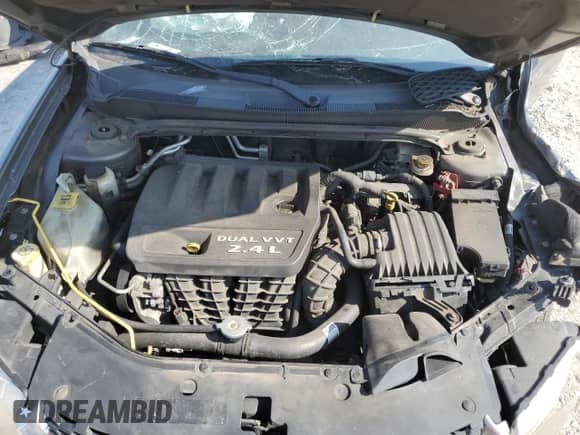 2012 Dodge Avenger SE with VIN 1C3CDZAB5CN147481, listed as a Copart auction lot 69565034 with Not provided miles and Salvage title. Bid and sale history available at DreamBid. Image 12.