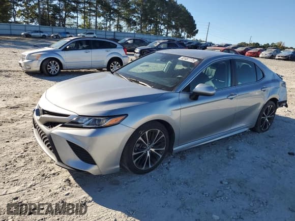 ✅ 2019 Toyota Camry SE • VIN: 4T1B11HK4KU255985 • Лот: 82487775. Опубликован ранее на Copart с пробегом 43 389 миль. Бесплатный доступ к архиву аукционных продаж из США и подробный отчёт об истории автомобиля на DreamBid. Изображение 1.