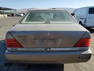 ✅ 1992 Mercedes-Benz 400 • VIN: WDBGA42E1NA054743 • Лот: 74571374. Опубликован ранее на Copart с пробегом 132 320 миль. Бесплатный доступ к архиву аукционных продаж из США и подробный отчёт об истории автомобиля на DreamBid. Изображение 6.