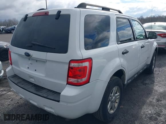 ✅ 2011 Ford Escape Hybrid • VIN: 1FMCU5K37BKB92669 • Lot: 43714192. Wystawiony na IAAI z przebiegiem 301 203 mil. Bezpłatny archiwum sprzedaży aukcyjnych z USA i szczegółowy raport historii pojazdu na DreamBid. Zdjęcie 4.