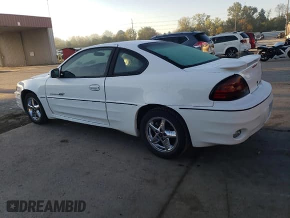 ✅ 2002 Pontiac Grand Am GT • VIN: 1G2NW12EX2C175459 • Лот: 75411384. Опубликован ранее на Copart с пробегом 83 462 миль. Бесплатный доступ к архиву аукционных продаж из США и подробный отчёт об истории автомобиля на DreamBid. Изображение 2.