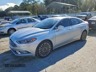 ✅ 2017 Ford Fusion Titanium • VIN: 3FA6P0K94HR401974 • Lot: 96107145. Listed on Copart with 143,236 mi. Free auction sales archive from the USA and detailed vehicle history report at DreamBid. Image 1.