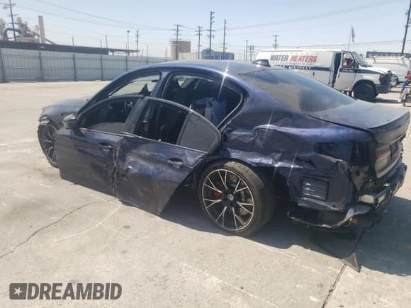 ✅ 2022 BMW M5 • VIN: WBS83CH03NCL02459 • Lot: 64102633. Wystawiony na Copart z przebiegiem 14 617 mil. Bezpłatny archiwum sprzedaży aukcyjnych z USA i szczegółowy raport historii pojazdu na DreamBid. Zdjęcie 2.