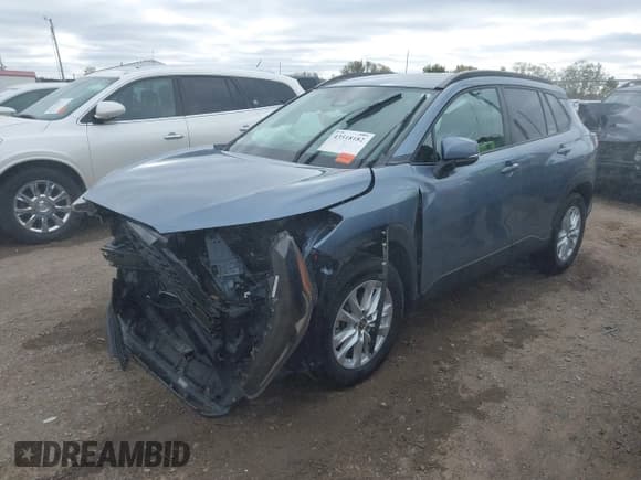 ✅ 2024 Toyota Corolla Cross LE • VIN: 7MUCAAAG6RV076303 • Lot: 43518182. Listed on IAAI with 32,242 mi. Free auction sales archive from the USA and detailed vehicle history report at DreamBid. Image 18.
