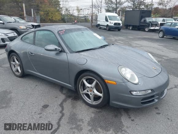 ✅ 2005 Porsche 911 Carrera 997 • VIN: WP0AA29985S716414 • Lot: 43590187. Wystawiony na IAAI z przebiegiem 117 108 mil. Bezpłatny archiwum sprzedaży aukcyjnych z USA i szczegółowy raport historii pojazdu na DreamBid. Zdjęcie 1.