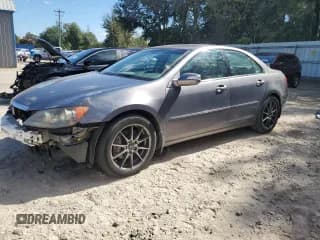 ✅ 2006 Acura RL • VIN: JH4KB16506C010867 • Lot: 90976745. Listed on Copart with 106,082 mi. Free auction sales archive from the USA and detailed vehicle history report at DreamBid. Image 1.