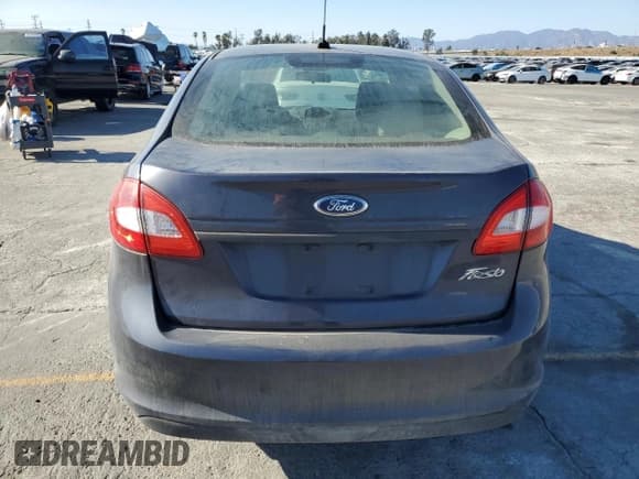 ✅ 2012 Ford Fiesta S • VIN: 3FADP4AJ7CM132076 • Лот: 84290745. Опубликован ранее на Copart с пробегом 121 193 миль. Бесплатный доступ к архиву аукционных продаж из США и подробный отчёт об истории автомобиля на DreamBid. Изображение 6.