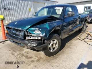 1998 Dodge Dakota SLT с VIN 1B7GL22X6WS661346, выставлен на аукционе Copart как лот 77401914 с пробегом 214 497 миль миль и Списание • Salvage title. История ставок и продаж доступна на DreamBid. Изображение 1.