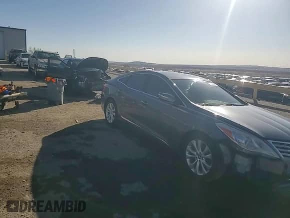 2012 Hyundai Azera с VIN KMHFG4JG4CA183714, выставлен на аукционе Copart как лот 48226105 с пробегом 120 700 миль миль и Списание • Salvage title. История ставок и продаж доступна на DreamBid. Изображение 13.