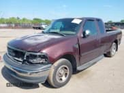 ✅ 2001 Ford F-150 XL • VIN: 1FTRX17W91NA84584 • Lot: 42122623. Listed on IAAI with Not provided. Free auction sales archive from the USA and detailed vehicle history report at DreamBid. Image 2.