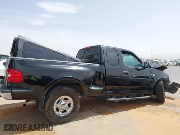 ✅ 1999 Ford F-150 XL • VIN: 1FTRX08L3XKB12260 • Lot: 42244781. Listed on IAAI with Not provided. Free auction sales archive from the USA and detailed vehicle history report at DreamBid. Image 12.