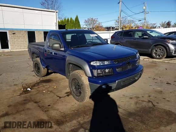 2012 Chevrolet Colorado Work Truck with VIN 1GCGTBFE3C8125018, listed as a Copart auction lot 90024745 with 156,864 mi miles and Salvage title. Bid and sale history available at DreamBid. Image 13.